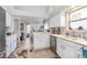 Well-maintained kitchen with ample counter space and a view of the backyard at 10518 Greenway Dr, Fishers, IN 46037