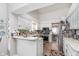 Bright kitchen with white cabinets, and stainless steel appliances at 10518 Greenway Dr, Fishers, IN 46037
