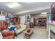 Open living space with fun decor and a view into an office area, blending entertainment and productivity at 10518 Greenway Dr, Fishers, IN 46037