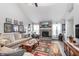 Cozy living room with fireplace, comfortable seating, and stylish decor at 10518 Greenway Dr, Fishers, IN 46037