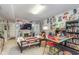 Spacious living room with diverse decor, offering a comfortable and quirky space for relaxation at 10518 Greenway Dr, Fishers, IN 46037