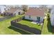 Aerial view of a fenced backyard, patio and home at 10876 Bellflower Ct, Indianapolis, IN 46235