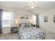 Bright bedroom featuring a comfortable bed, soft lighting, and serene decor at 10876 Bellflower Ct, Indianapolis, IN 46235