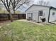 Backyard with a fenced-in area, composting bin, and shed at 122 Southlane Dr, New Whiteland, IN 46184