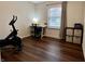 A flex room with an exercise bike and a bright window at 122 Southlane Dr, New Whiteland, IN 46184