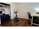 A flex room with an exercise bike, desk and closet at 122 Southlane Dr, New Whiteland, IN 46184