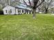 Charming exterior view of a well-maintained home, nestled within a beautifully landscaped front yard at 122 Southlane Dr, New Whiteland, IN 46184