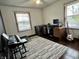 Office space with bright windows, hardwood floors and dual work stations at 122 Southlane Dr, New Whiteland, IN 46184