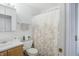 Bathroom with neutral walls, patterned shower curtain, and modern sink at 12223 Split Granite Dr, Fishers, IN 46037