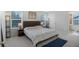Bedroom with neutral colored walls and carpet plus windows and lamps to add extra light at 12223 Split Granite Dr, Fishers, IN 46037