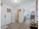 Bright foyer with hardwood floors, white trim, and a view into the open-concept living space at 12223 Split Granite Dr, Fishers, IN 46037