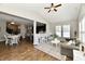Open concept living space with hardwood flooring, seamlessly connects to the kitchen and living room at 1291 Timber Bluff Rd, Westfield, IN 46074