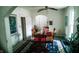 Dining room with vintage furnishings, lighting, area rug, and archway features at 1303 S Shipley St, Muncie, IN 47302