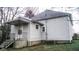 This home boasts a charming side entry, with a small covered porch and convenient access at 1303 S Shipley St, Muncie, IN 47302