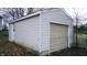 This property includes a practical, detached garage for parking and extra storage at 1303 S Shipley St, Muncie, IN 47302