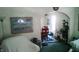 Comfortable living area featuring an open archway to the dining area with vintage furnishings at 1303 S Shipley St, Muncie, IN 47302