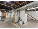 Unfinished basement space with exposed ceiling beams at 1417 Sturm Ave, Indianapolis, IN 46201