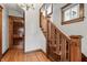 Elegant foyer with a wooden staircase and hardwood floors at 1417 Sturm Ave, Indianapolis, IN 46201