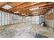 Spacious garage interior with open studs, ready for customization and ample storage solutions at 1417 Sturm Ave, Indianapolis, IN 46201