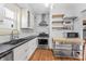 Updated kitchen features stainless steel appliances and stylish island at 1417 Sturm Ave, Indianapolis, IN 46201