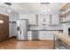 Modern kitchen with stainless steel appliances and stylish cabinets at 1417 Sturm Ave, Indianapolis, IN 46201