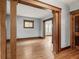 Spacious living room with hardwood floors and decorative wood trim throughout at 1417 Sturm Ave, Indianapolis, IN 46201