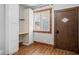 Bright room features a built-in desk, storage cabinets, a window and wood trim at 1417 Sturm Ave, Indianapolis, IN 46201