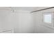 Unfinished space with a window and white painted walls at 1417 Sturm Ave, Indianapolis, IN 46201
