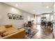 Inviting living room with wood floors, stylish decor, and seamless flow to the adjacent kitchen area at 1603 E Market St, Indianapolis, IN 46201