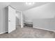 Bedroom featuring carpeted flooring, gray walls, ceiling light and built-in bench and storage at 1621 E 44Th St, Indianapolis, IN 46205