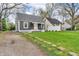 Cozy single Gathering home with a gravel driveway and spacious front lawn at 1621 E 44Th St, Indianapolis, IN 46205