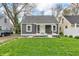 Beautifully renovated one-story house featuring a well-kept lawn and inviting entrance at 1621 E 44Th St, Indianapolis, IN 46205