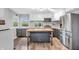 Bright kitchen featuring stainless steel appliances, wood floors and a butcher block island at 1621 E 44Th St, Indianapolis, IN 46205