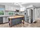 Modern kitchen features stainless steel appliances, butcher block island and white cabinets at 1621 E 44Th St, Indianapolis, IN 46205