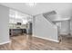 Open floor plan featuring hardwood floors, staircase and pass-through to the kitchen at 1621 E 44Th St, Indianapolis, IN 46205