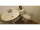 Clean bathroom featuring white toilet and sink at 17026 Cowbell Dr, Noblesville, IN 46060