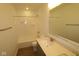 Bathroom featuring a shower-tub combo, large mirror, and sink at 17026 Cowbell Dr, Noblesville, IN 46060