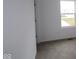 Bedroom featuring neutral carpet, white walls, and a window for natural light at 17026 Cowbell Dr, Noblesville, IN 46060