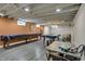 Finished basement featuring a game room with pool table and ample space for recreation at 1750 W Stop 11 Rd, Indianapolis, IN 46217