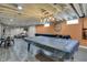 Finished basement with recreational area, ping pong table, and comfortable living space at 1750 W Stop 11 Rd, Indianapolis, IN 46217