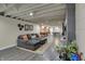 Finished basement with a large TV, sectional, and pool table at 1750 W Stop 11 Rd, Indianapolis, IN 46217