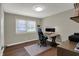 Bright office space with a large window and desk at 1750 W Stop 11 Rd, Indianapolis, IN 46217