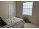 Bedroom with double door closet and window at 18346 Piers End Dr, Noblesville, IN 46062