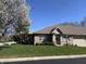 Well-maintained single-Gathering home with a manicured lawn and mature landscaping under a sunny sky at 18346 Piers End Dr, Noblesville, IN 46062