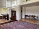 Spacious living room featuring hardwood floors, open layout, and ample natural light at 18346 Piers End Dr, Noblesville, IN 46062