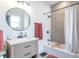 Modern bathroom featuring hexagon shower tile and updated vanity at 1838 Applegate St, Indianapolis, IN 46203