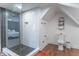 Bathroom featuring a glass-enclosed shower and modern fixtures at 1838 Applegate St, Indianapolis, IN 46203