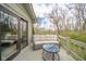 Deck view with cozy outdoor seating and nearby sliding glass doors at 206 Somerville Rd, Anderson, IN 46011