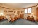 Cozy bedroom with hardwood furniture, warm lighting, and comfortable furnishings at 206 Somerville Rd, Anderson, IN 46011