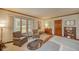 Bedroom featuring large windows, soft natural light, and elegant decor at 206 Somerville Rd, Anderson, IN 46011
